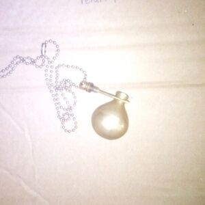 Vintage, solid brass cigar piercer , flask shaped with hanging ring